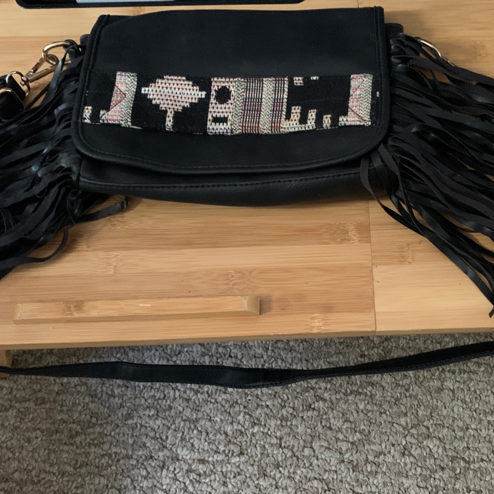Chic Black Crossbody Bag with Fringe and Patterned Flap
